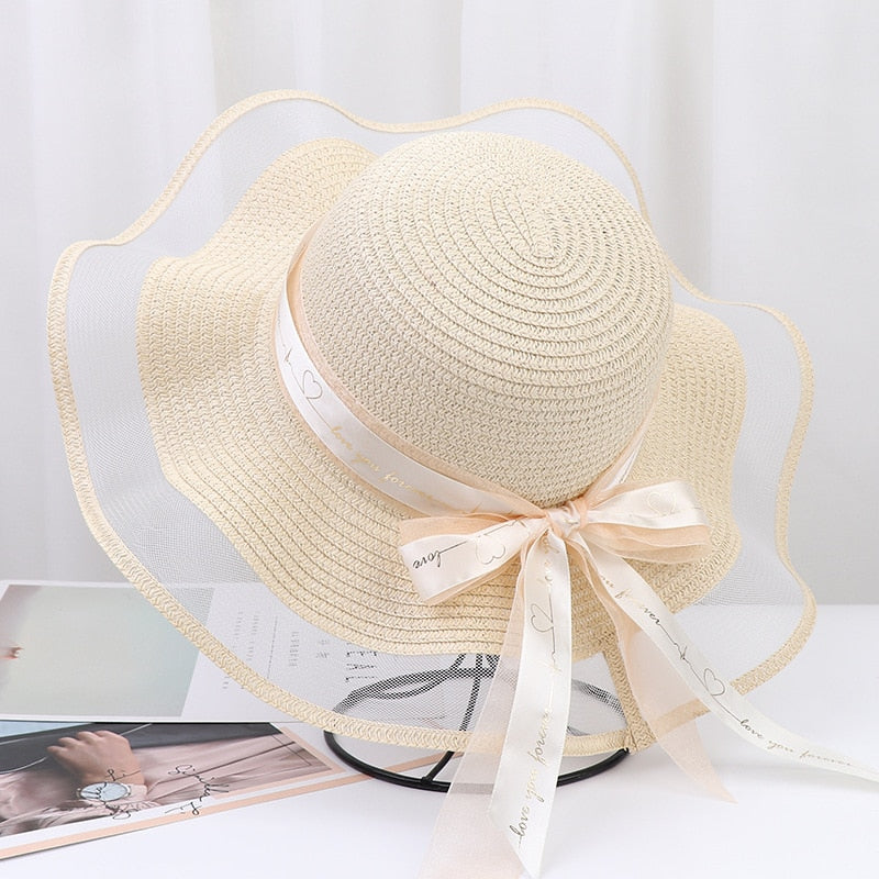 2024 New Korean Style Woman Straw Hat Bow Ribbon Large Brim Sunshade Ins Outing Fashion Beach Holiday ladies sun Hat Beige 57 cm