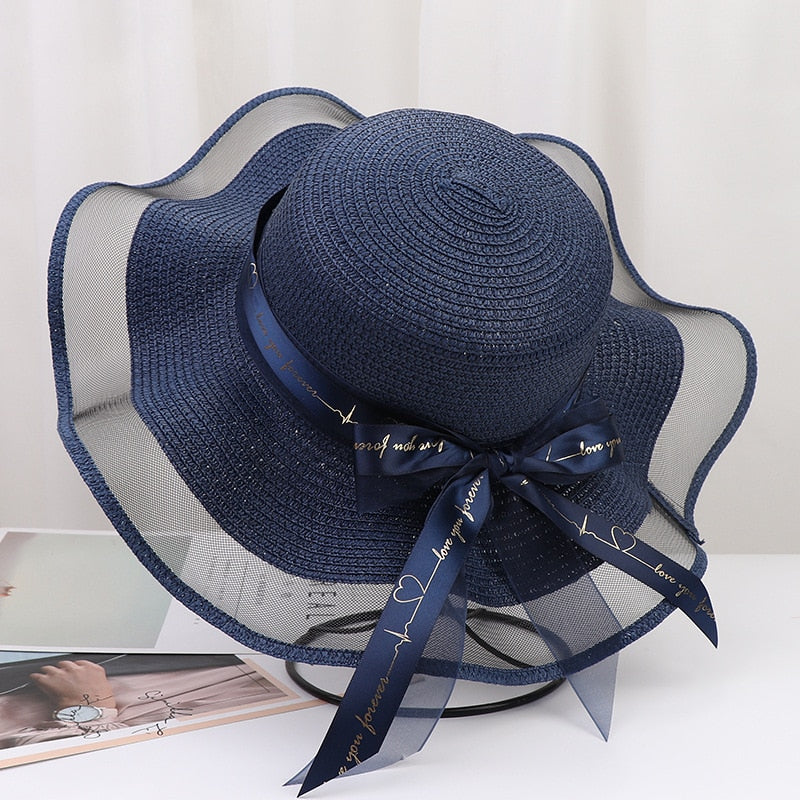 2024 New Korean Style Woman Straw Hat Bow Ribbon Large Brim Sunshade Ins Outing Fashion Beach Holiday ladies sun Hat Navy Blue 57 cm