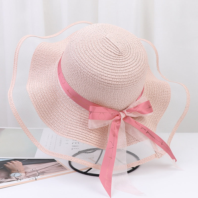 2024 New Korean Style Woman Straw Hat Bow Ribbon Large Brim Sunshade Ins Outing Fashion Beach Holiday ladies sun Hat Pink 57 cm
