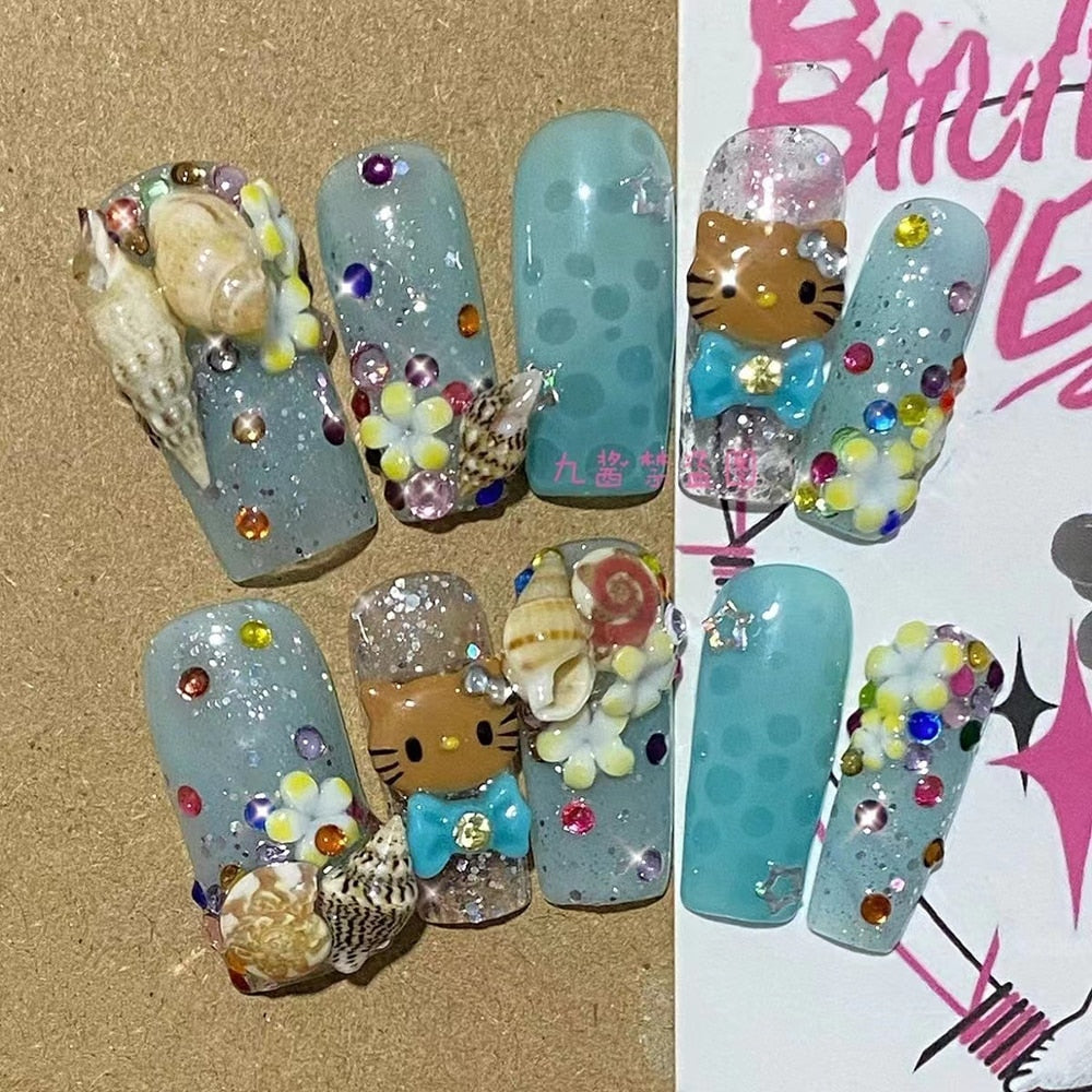 Été plage voyage vacances Hello Kitty conque ongles fille bleu jeunesse travail manuel personnalisable faux ongles fille soeur cadeau