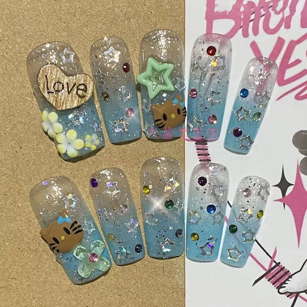 Été plage voyage vacances Hello Kitty conque ongles fille bleu jeunesse travail manuel personnalisable faux ongles fille soeur cadeau