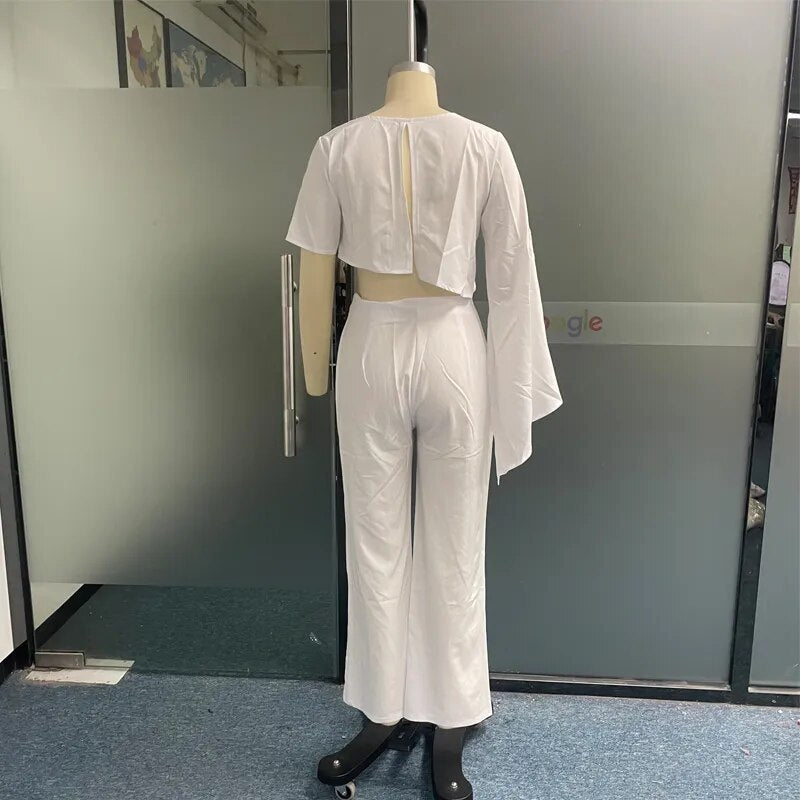 女性ツーピースセット秋のファッション O ネックハイとロー非対称スリーブトップロングパンツセット固体ハイストリート