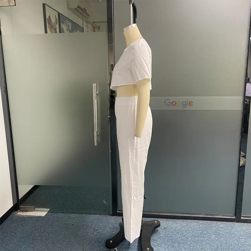 女性ツーピースセット秋のファッション O ネックハイとロー非対称スリーブトップロングパンツセット固体ハイストリート