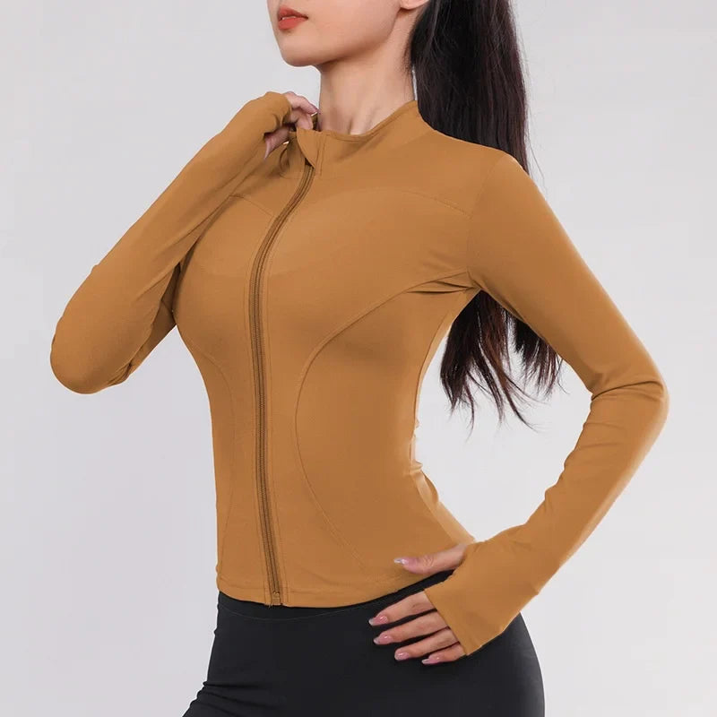 Women Gym Wear Solid Color Quick Drying Yoga Wear High Elasticity Fitness Jacket Ventilated Long Sports Shirt Women's Tracksuit pumpkin color