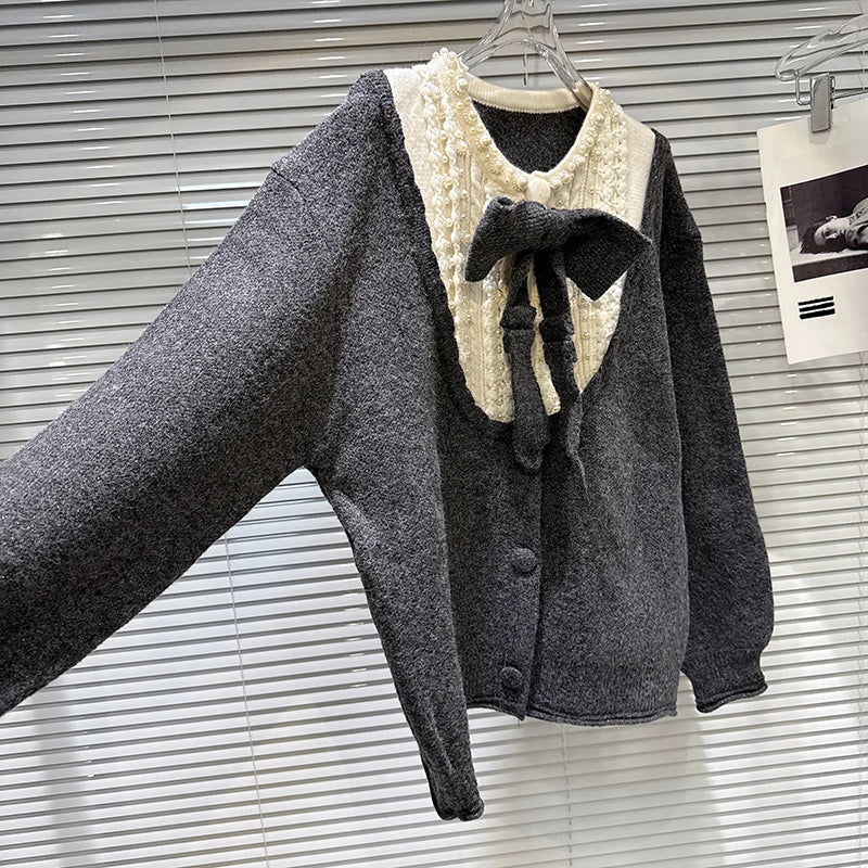 Winter New Fashion Bow Pin Contrast Color Loose Knitted Sweater For Women Single-breasted Cardigan Female 11A07833