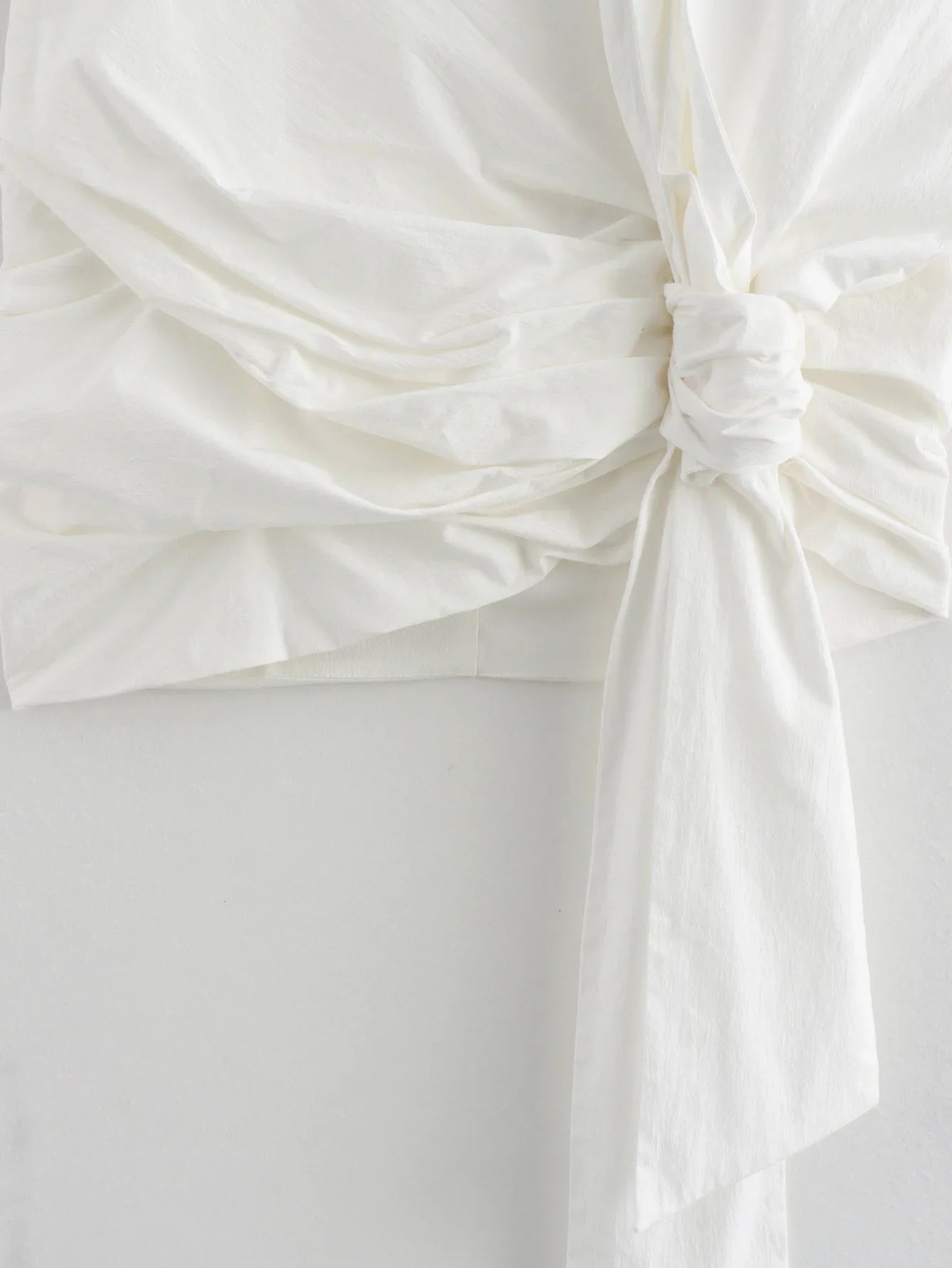 TRAFZA Elegant Woman Solid Back Zipper High Waist Short Skirts Women Summer Chic Asymmetric Bow Lace-Up Decorate Mini Skirt Y2K