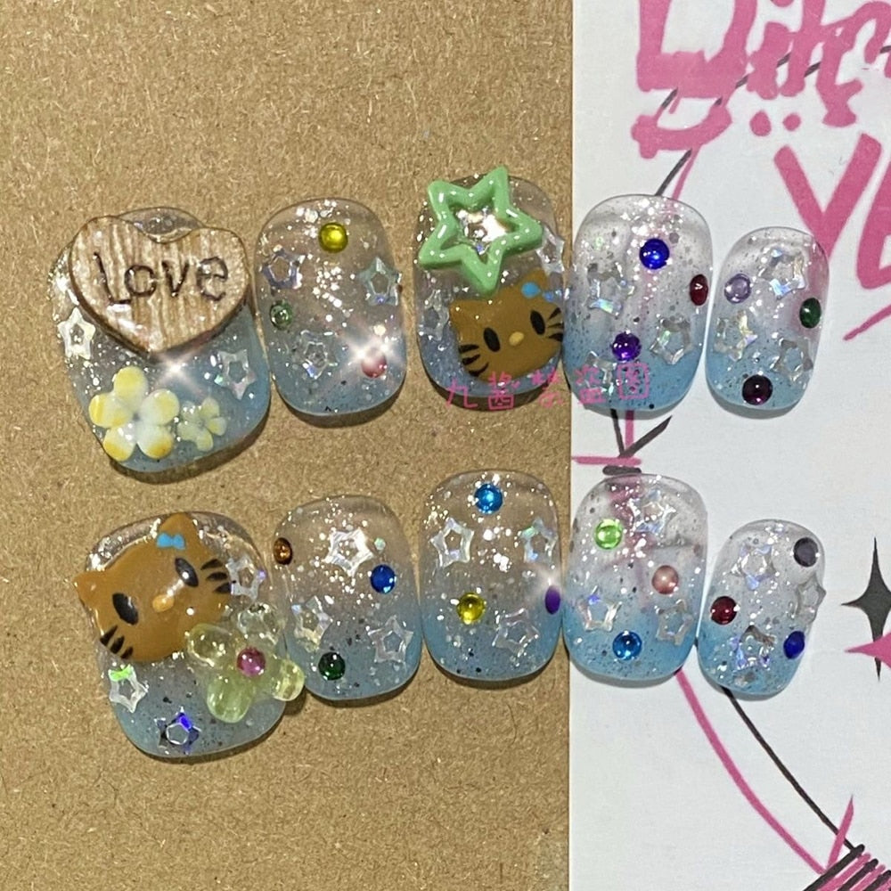 Été plage voyage vacances Hello Kitty conque ongles fille bleu jeunesse travail manuel personnalisable faux ongles fille soeur cadeau