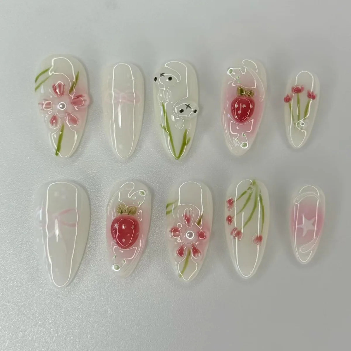 24Pcs Green Oval False Nails with Strawberry Design Wearable Mid-length Almond Press on Fake Nails Rabbit Pattern Nail Art Tip 1094