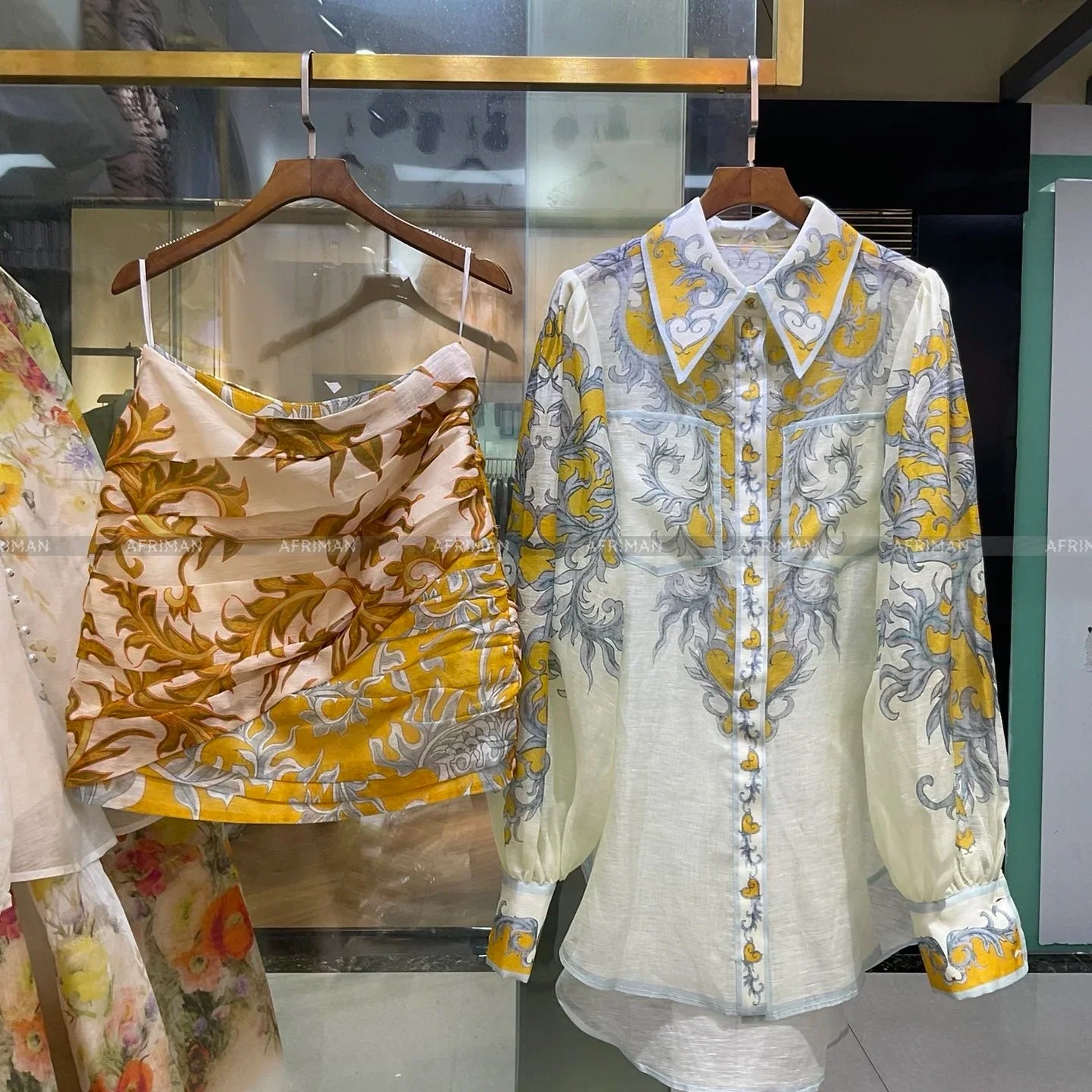 Women Position Printed Lantern Sleeve Lapel Loose Linen Shirt + Pleated Buttocks Wrapped Short Skirt Set