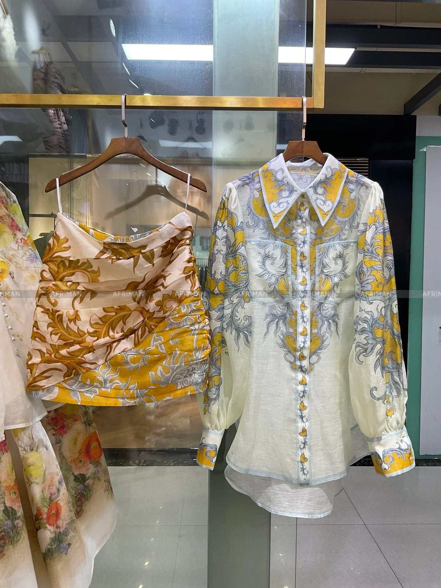 Women Position Printed Lantern Sleeve Lapel Loose Linen Shirt + Pleated Buttocks Wrapped Short Skirt Set