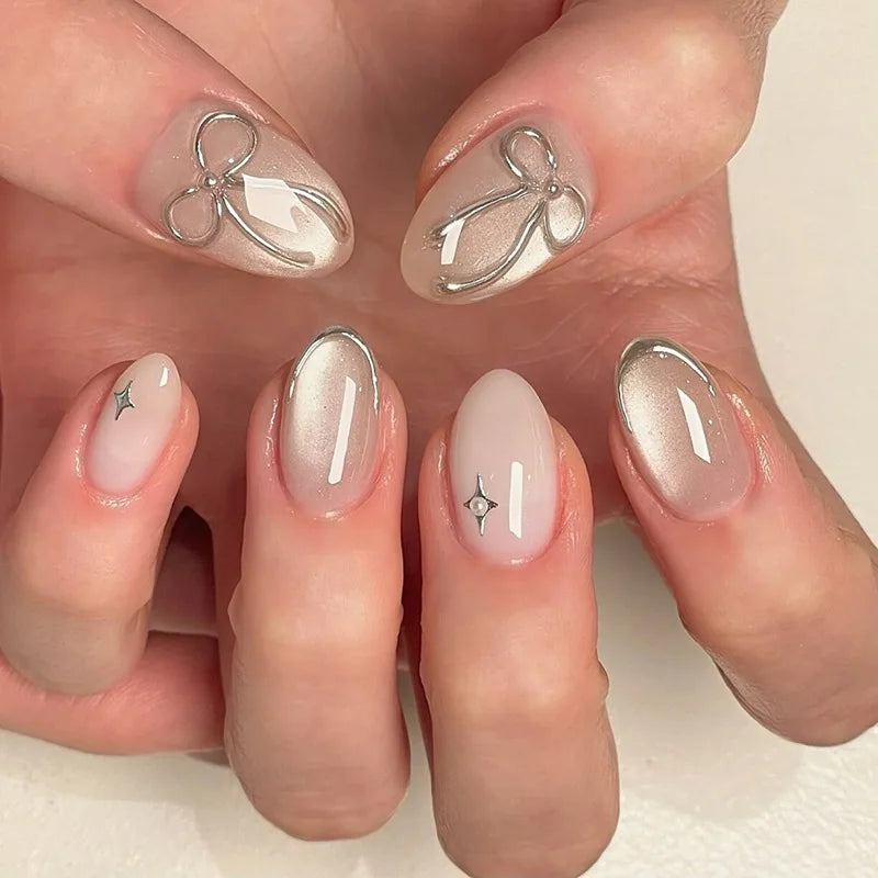 24Pcs Cat's Eye Design Fake Nail with Pearl Short Round Head Press on False Nails Silver French Bow Pattern Full Cover Nail Tips 1076