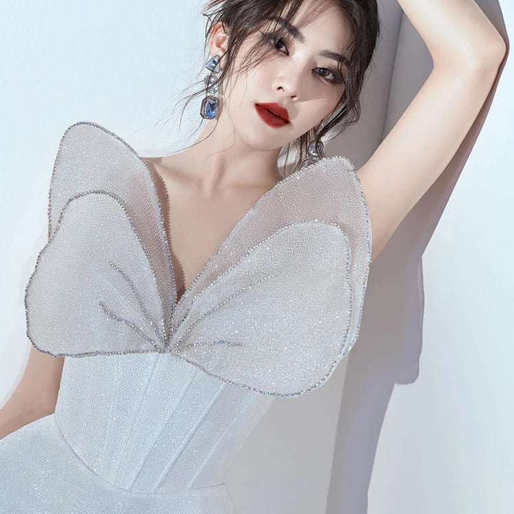 Glamorous White Strapless Mini Dress with Sparkling Butterfly Detailing for a Gala Event