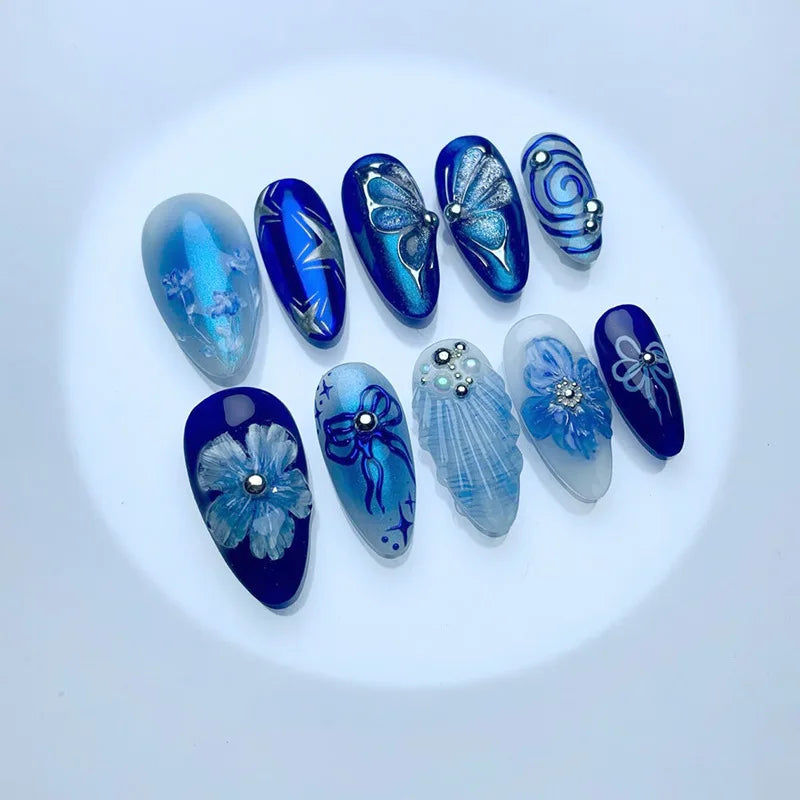 24Pcs Mid-length Blue Almond False Nails with 3D Shell Design Press on Nails Tips Butterfly Flower Pattern Datachable Fake Nail Z1102