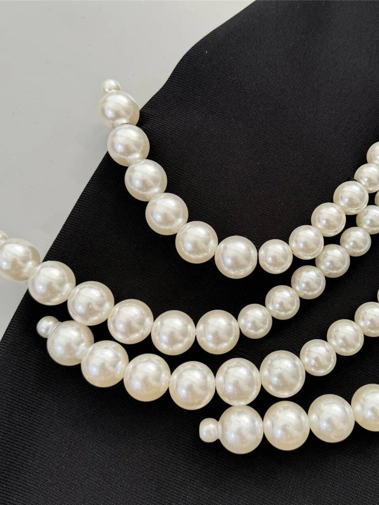 Exquisite Black Velvet Mermaid Gown with Statement Pearl Decor for a Special Occasion Dress