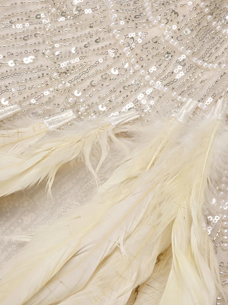 Nude Strapless Crystals Embellished Long Dress Sheath Low V Neck Sleeveless Feather High Side Slit Floor Length Evening Gown