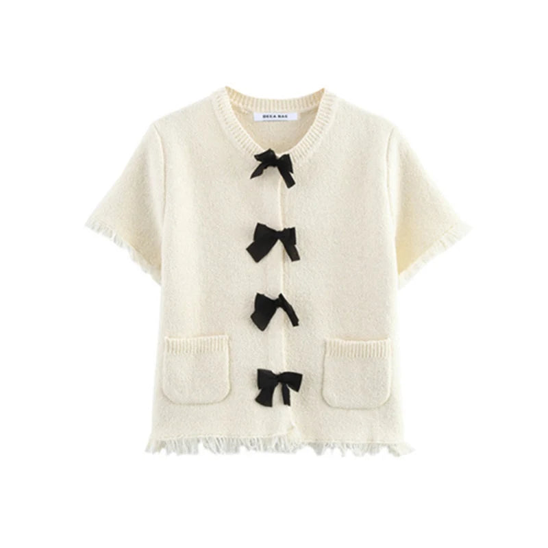 Women's suit New Spring 2025 Black bow trim White knitted long-sleeved jacket Mini skirt Celebrity style Elegant