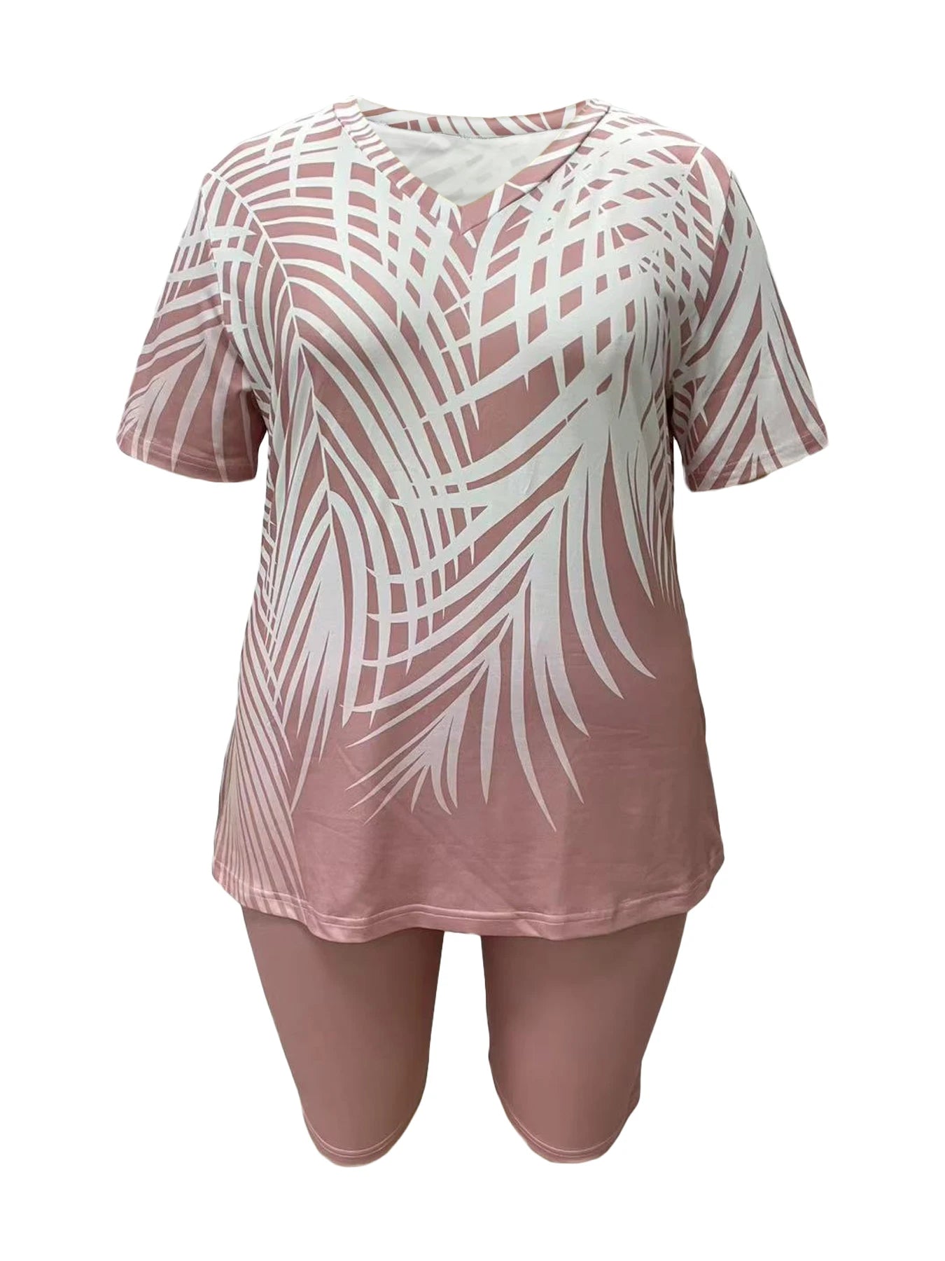 Plus size women's fashion casual vacation short sleeve set with printed top and solid color bottom.