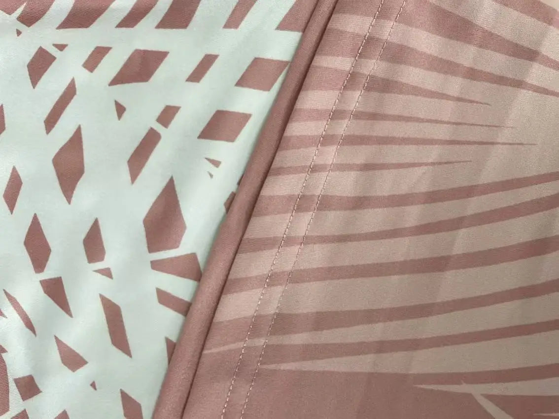 Plus size women's fashion casual vacation short sleeve set with printed top and solid color bottom.