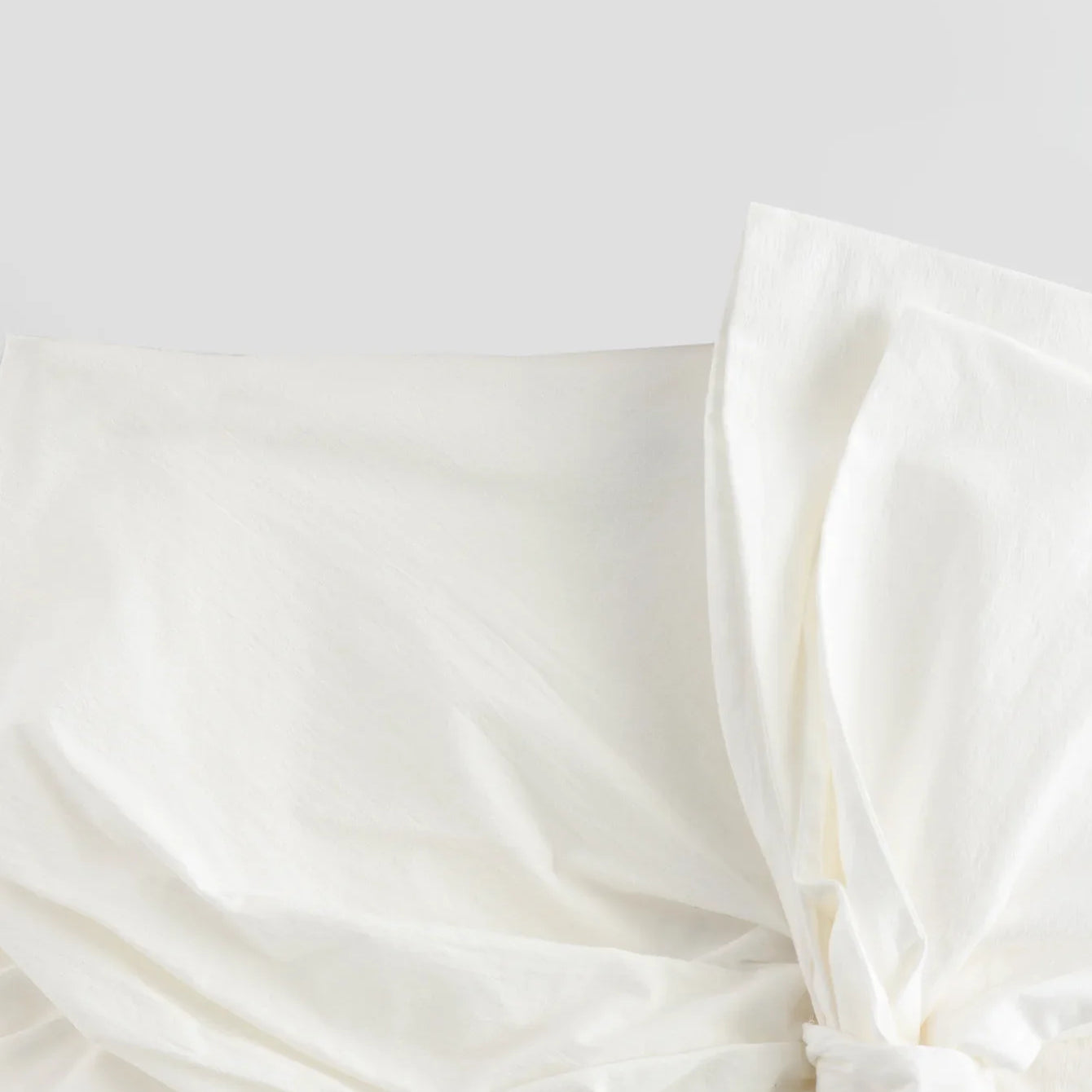 TRAFZA Elegant Woman Solid Back Zipper High Waist Short Skirts Women Summer Chic Asymmetric Bow Lace-Up Decorate Mini Skirt Y2K