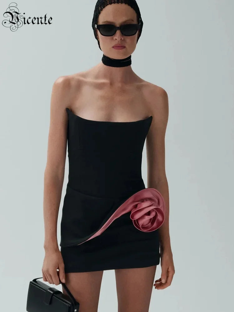 Edgy Strapless Black Mini Dress with Pink Satin Ruffle for a Fashion-Forward Party Gown