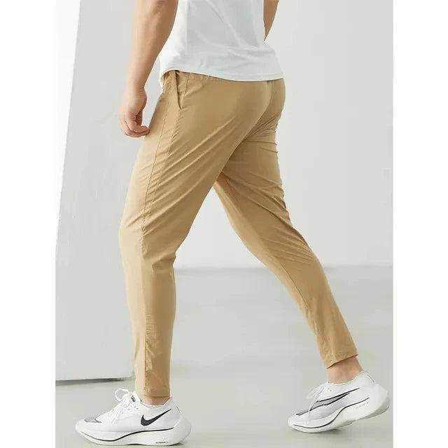 Running Pants Men Sportswear Elastic Jogging Sweatpants Gym Fitness Tight Trousers Quick Dry Thin Tracksuit Training Sport Pants Khaki