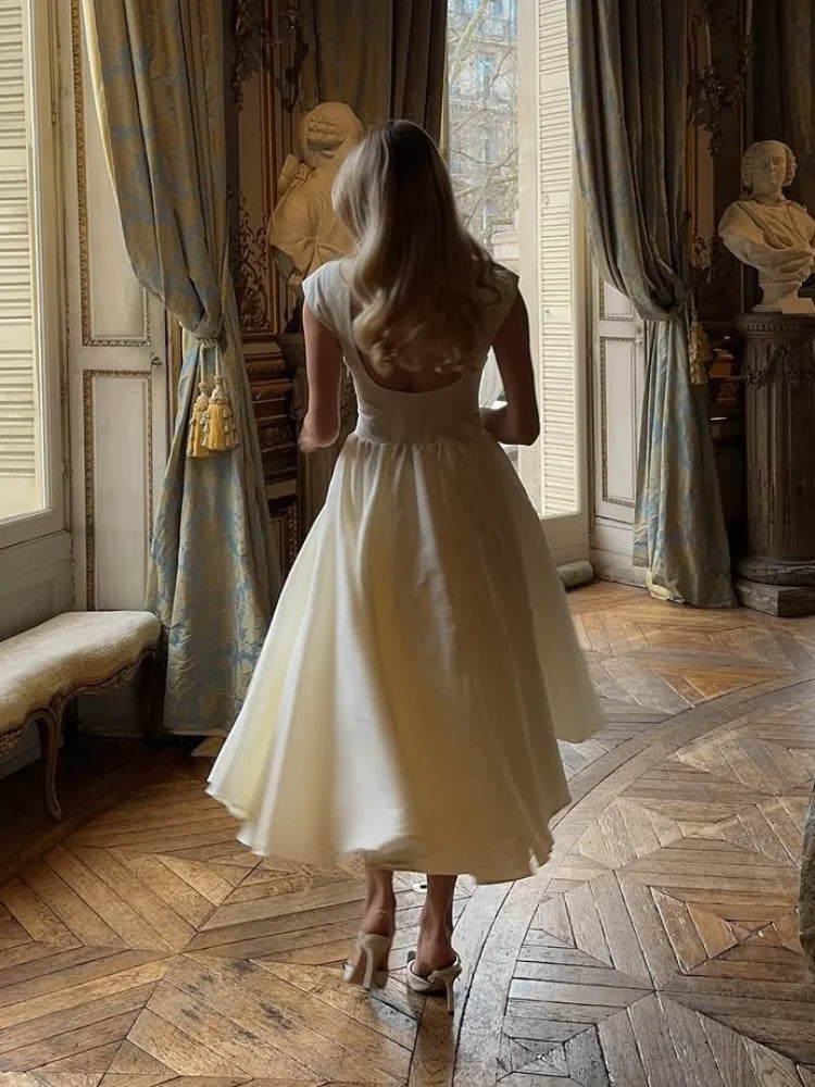 2025 Elegant White O Neck Pleated Hem Maxi Dress Women Fashion Open Back Solid A-line Dresses New Spring Summer Lady Party Robes