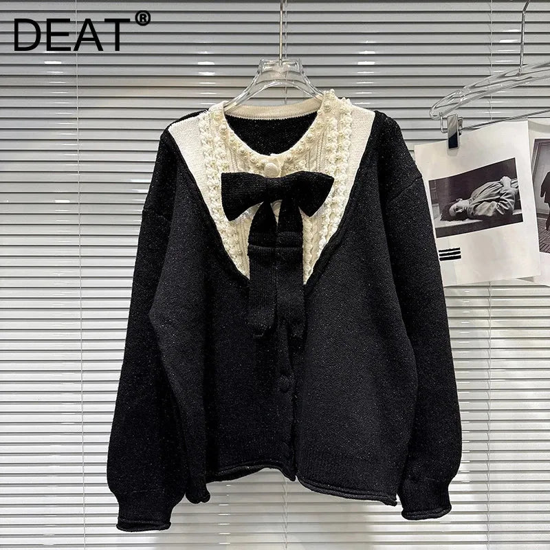 Winter New Fashion Bow Pin Contrast Color Loose Knitted Sweater For Women Single-breasted Cardigan Female 11A07833