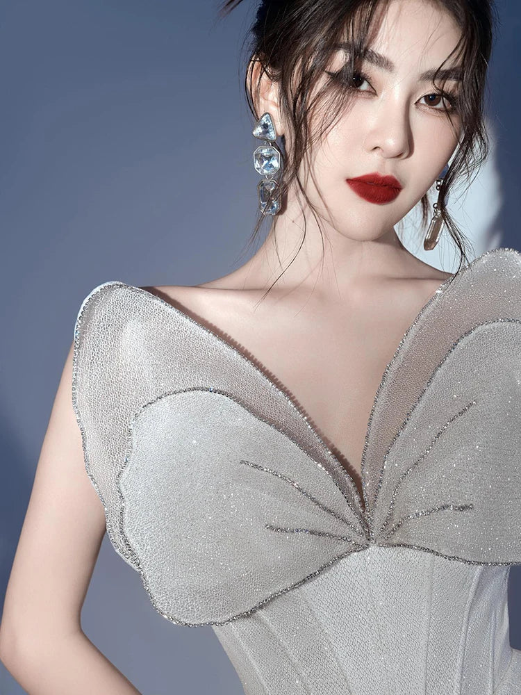 Glamorous White Strapless Mini Dress with Sparkling Butterfly Detailing for a Gala Event