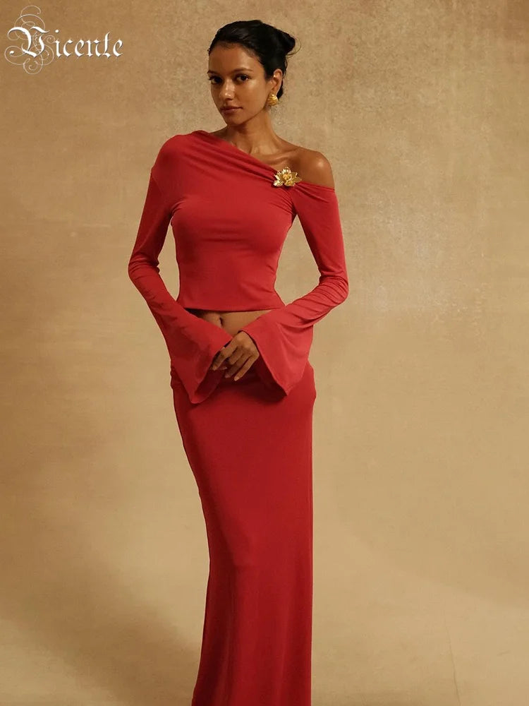 Chic One-Shoulder Crop Top and Maxi Skirt Ensemble with Floral Accents for a Special Occasion Evening Gown