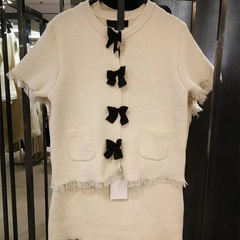 Women's suit New Spring 2025 Black bow trim White knitted long-sleeved jacket Mini skirt Celebrity style Elegant