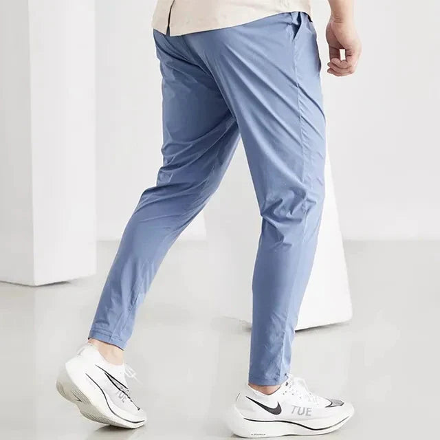 Running Pants Men Sportswear Elastic Jogging Sweatpants Gym Fitness Tight Trousers Quick Dry Thin Tracksuit Training Sport Pants Light Blue