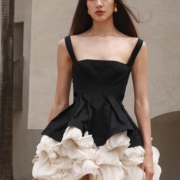 Elegant Black Mini Dress with Peplum and White Ruffle Accents for Upscale Casual Gatherings